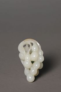 A Carved Jade Double-Gourd Pendant