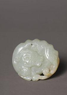 A Carved Jade Mythical Beast Pendant