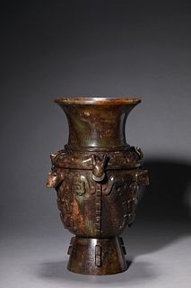 A Carved Burnt Dragon Dragon-Form Zun Vase