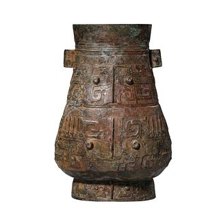 A Bronze Ritual Taotie Zun Vase