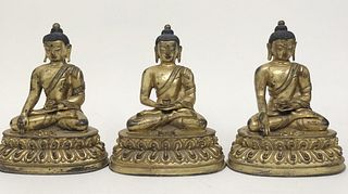 A Group of Gilt Bronze San Bao Buddha Statues