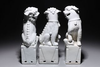Group of Three Chinese Blanc de Chine Porcelain Foo Lions