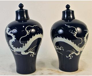 PAIR OF BLUE AND WHITE DRAGON JARS WITH LIDS