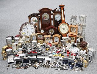 A LARGE COLLECTION OF CLOCKS AND WATCHES FROM A WATCH REPAIR SHOP, includin