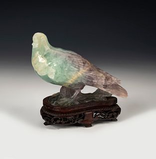 Pair of pigeons. China, 20th century. 
Jade carved by hand on wooden base.