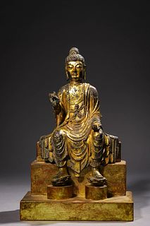 An Early Gilt Bronze Seated Buddha Shakyamuni Statue