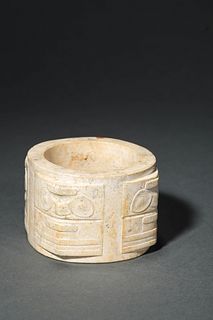 An Early Carved Jadestone Cong