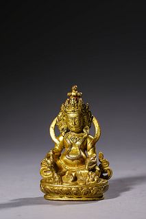 Ming Dynasty: A Gilt bronze God of Wealth  statue