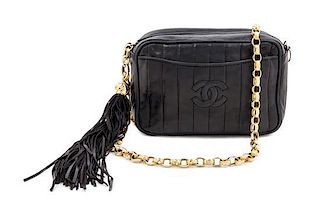 A Chanel Black Leather Handbag, 8.5" x 5".