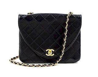 A Chanel Navy Classic Leather Handbag, 8.5" x 6.5" x 3".