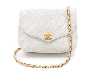 A Chanel White Classic Leather Flap Bag, 9" x 7" x 3".