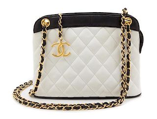 A Chanel White Leather Quilted Handbag, 10.5" x 8".