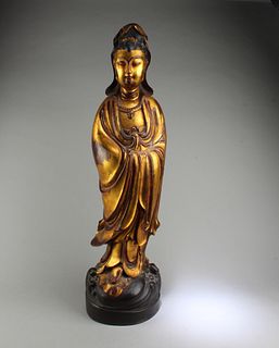 A Carved Gilt Wooden Guanyin Statue