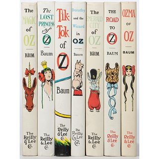 Collection of 7 1960's White Edition Oz Books by L. Frank Baum