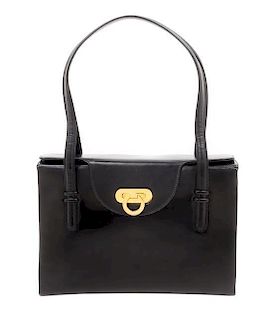A Gucci Black Leather Handbag, 10.75" x 7.5" x 3".
