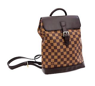 A Louis Vuitton Signature Leather Backpack, 11.5" x 12.5" x 4".