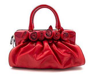 * A Valentino Red Leather Handbag, 14.5" x 7" x 6".