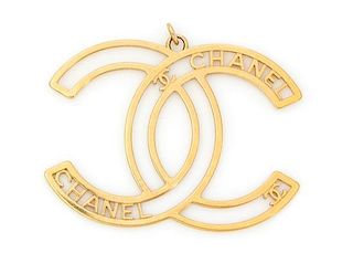 A Chanel Goldtone Large Logo Charm, 3.5" x 2.5"