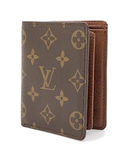 A Louis Vuitton Men's Wallet, 4.5" x 3.75".