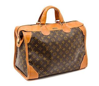 * A Louis Vuitton Monogram Canvas Travel Bag, 16" x 13" x 9".
