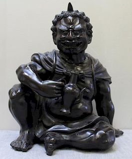 Asian Patinated Bronze Figure of a Seated Man