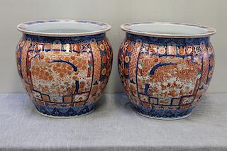A Large Pair Of Vintage Imari Porcelain Urns .