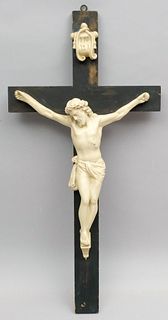 White Plaster Crucifix on Black Cross