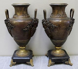 Pair of Fine Quality Bronze Urns on Marble Bases.