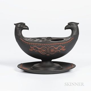 Wedgwood Black Basalt Inkstand, England, early 19th century, bird-head handles with applied rosso antico arabesque flowers below a coiled ribbon borde