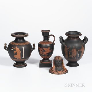 Four Encaustic Decorated Black Basalt Items, England, 19th century, each with iron red and black, including a canopic jar cover, ht. 4; and three vase