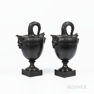 Two Non-period, Non Factory Black Basalt Stella Fishtail Ewers, England, each modeled with scales to fish tail handles and top, mask below the spout a
