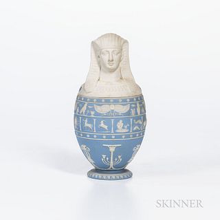Wedgwood Light Blue Jasper Dip Canopic Jar and Cover, England, c. 1868, with applied white bands of hieroglyphs and zodiac signs above Egyptian motifs