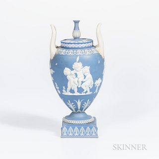 Wedgwood Solid Light Blue Jasper Vase and Cover, England, early 19th century, urn finial, applied white upturned loop handles and classical figures in