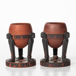 Pair of Wedgwood Rosso Antico Egyptian Tripod Vases, England, early 19th century, applied black basalt sphinx-form legs and black washed band and base