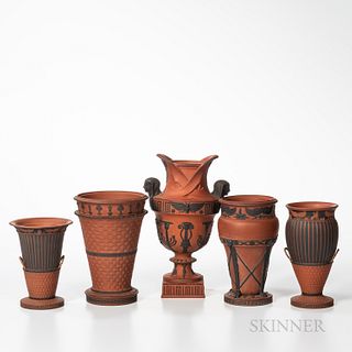 Five Wedgwood Rosso Antico Egyptian Vases, England, 19th century, three with black basalt relief, an engine-turned basketweave, ht. 8 3/4; a vase with