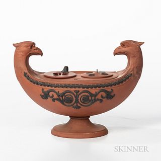 Wedgwood Rosso Antico Inkstand, England, early 19th century, oval form modeled with two bird-head handles and two central wells with inserts, coiled r