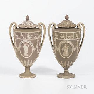 Two Wedgwood Lilac Jasper Dip Vases and Covers, England, 19th century, scrolled foliate handles, applied white relief with signs of the zodiac above c