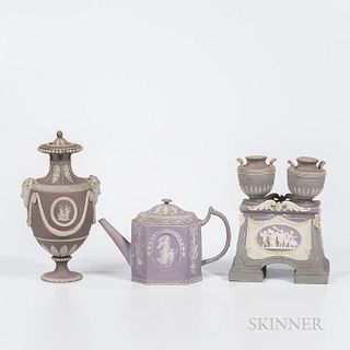 Three Wedgwood Lilac Jasper Dip Items, England, 19th century, each with applied white classical figures and foliate borders, a covered vase with Bacch