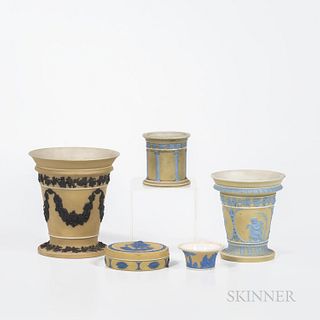 Five Wedgwood Yellow Jasper Dip Items, England, 19th and 20th century, a vase with black fruiting grapevine festoons and border, ht. 6; two with light
