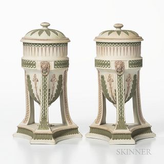 Pair of Wedgwood Tricolor Jasper Urns and Covers, England, 19th century, each solid white with applied lilac and green relief, acanthus and bellflower