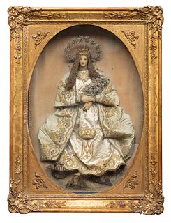 Virgin of dress of the XVIII century. 
Modeled wax. Cloth vestments.