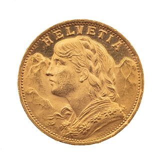 Moneda de 20 FR Helvetia en oro amarillo de 21K. Peso: 6.5 g.