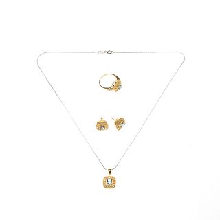 Collar, pendiente, anillo y par de aretes con topacios en plata dorada .925. 4 topacios corte cojín. Talla: 6. Peso: 9.8 g.