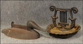 2 CAST IRON BOOT SCRAPERS 1 DUCK & 1 LYRE BASE