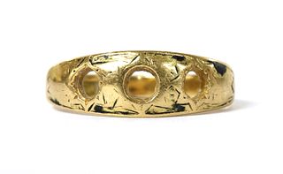 A gold three stone vacant ring mount,