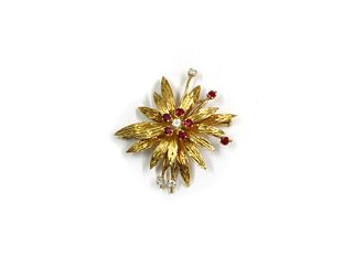 An 18ct gold diamond and ruby flowerhead brooch,