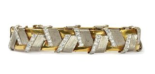 A two colour gold diamond bracelet,