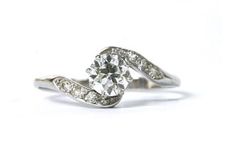 A platinum diamond crossover ring,