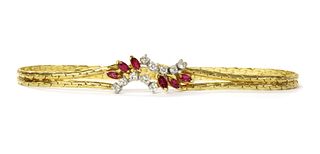 An 18ct gold ruby and diamond bracelet,