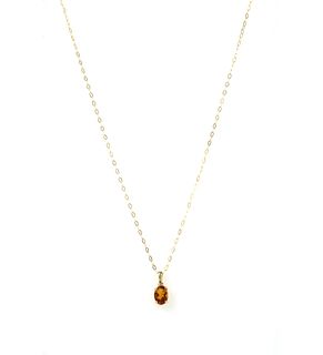 A gold single stone citrine pendant,